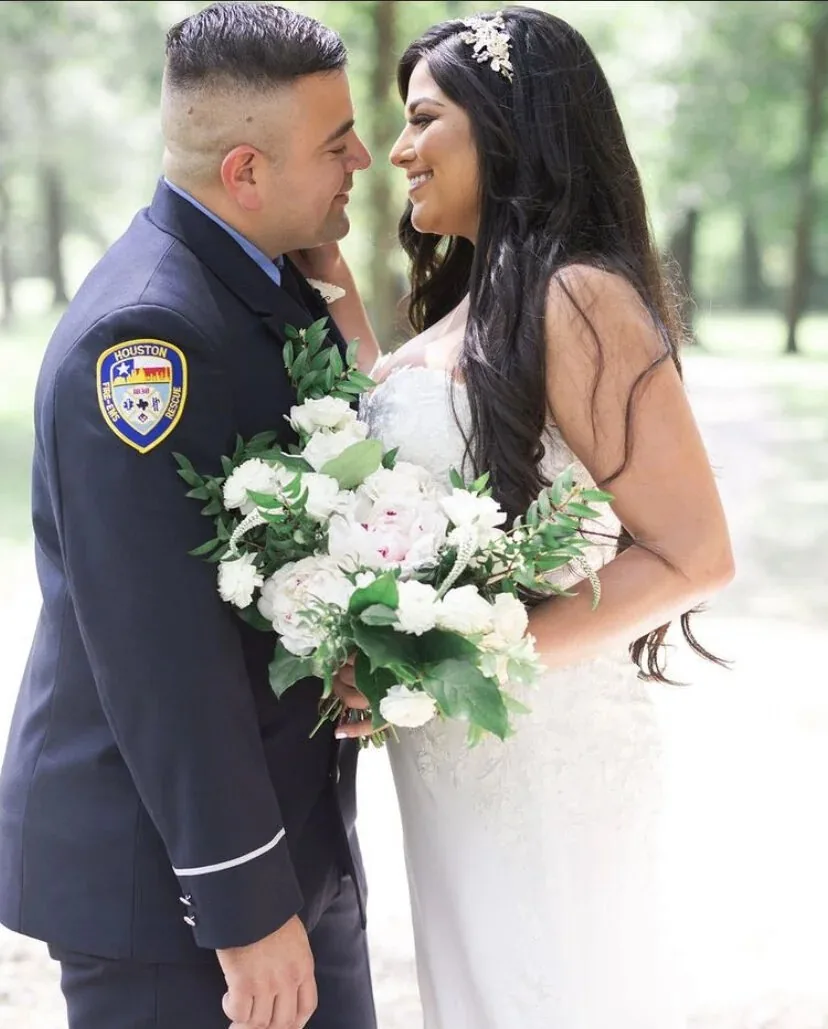 Bride and groom sharing an intimate wedding portrait